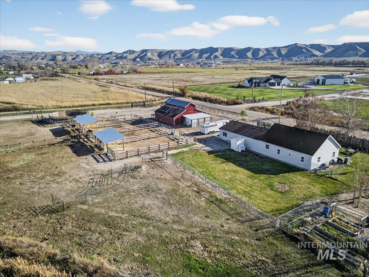 2588 West Sales Yard Road Emmett, ID 83617 - Photo 37 of 50 Aerial view of sparsely populated area featuring a mountainous background