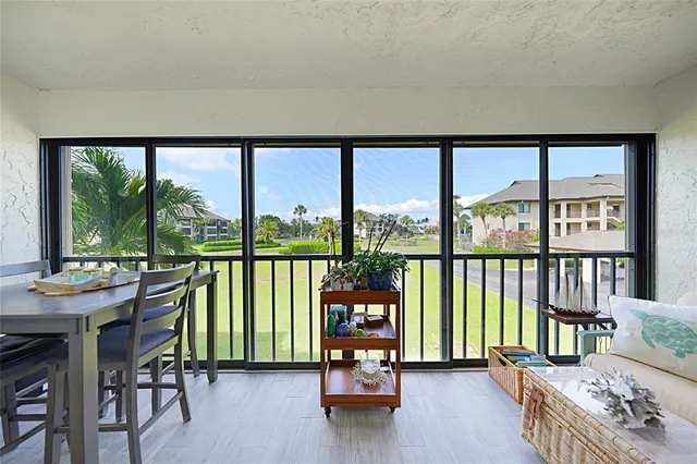a kitchen with a table and chairs in it