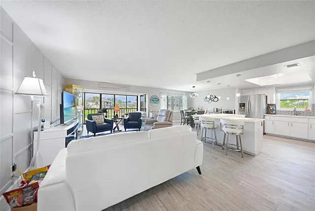 a kitchen with a refrigerator stove and microwave