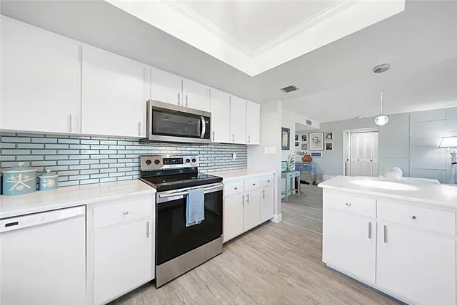 a view of a hallway with a outdoor space