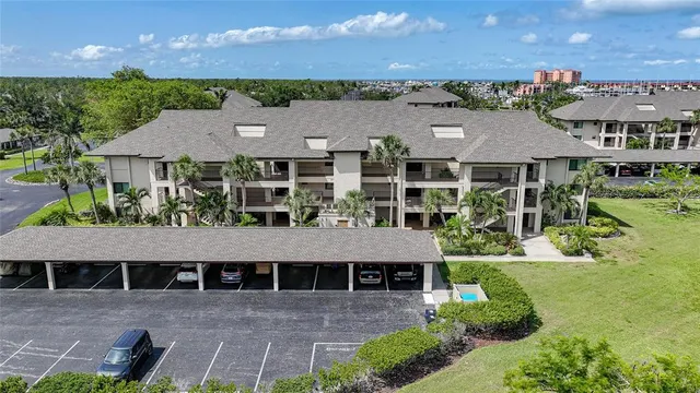 a view of a chairs and table in a backyard