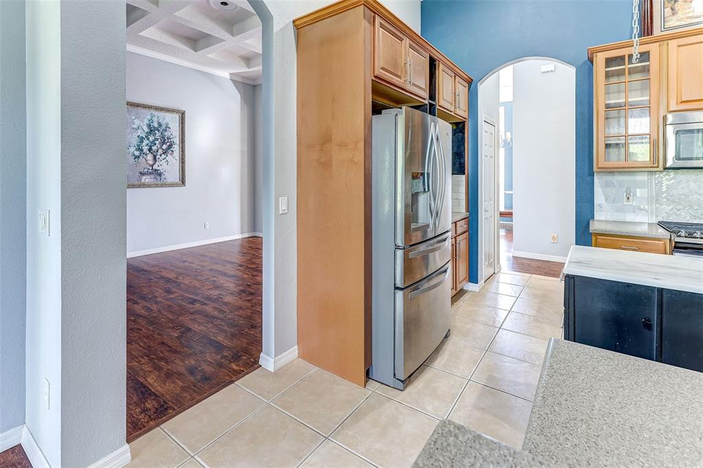 918 Algare Loop Windermere, FL 34786 - Photo 29 of 73 a kitchen with stainless steel appliances granite countertop a refrigerator and a stove