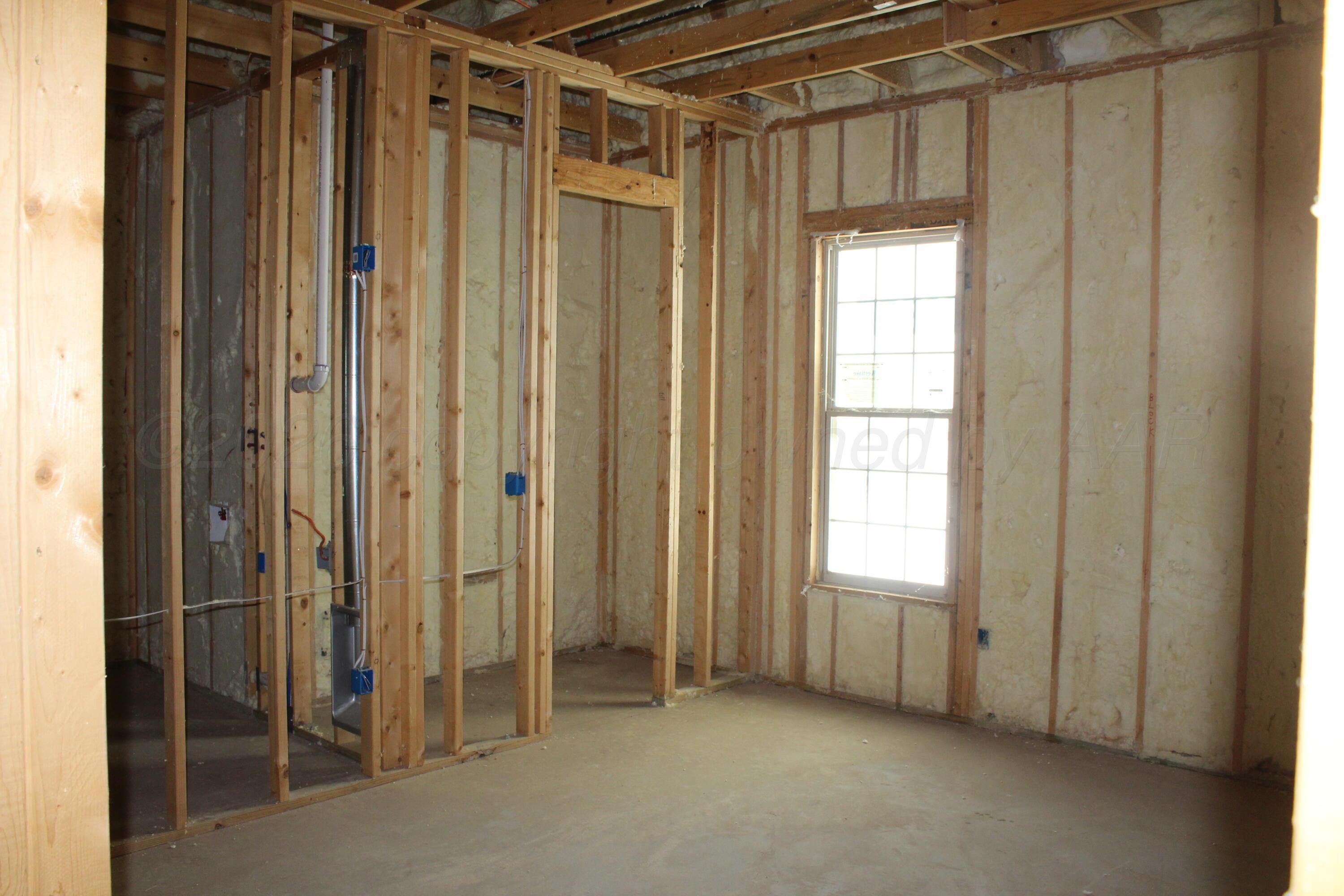 8300 Matilda Lane Amarillo, TX 79119 - Photo 13 of 14 a view of an empty room with a window