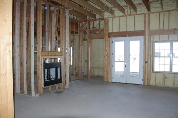 a view of an empty room and window