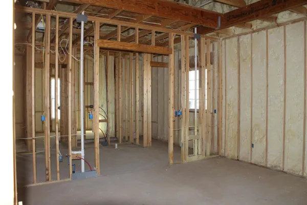 a view of front door with balcony