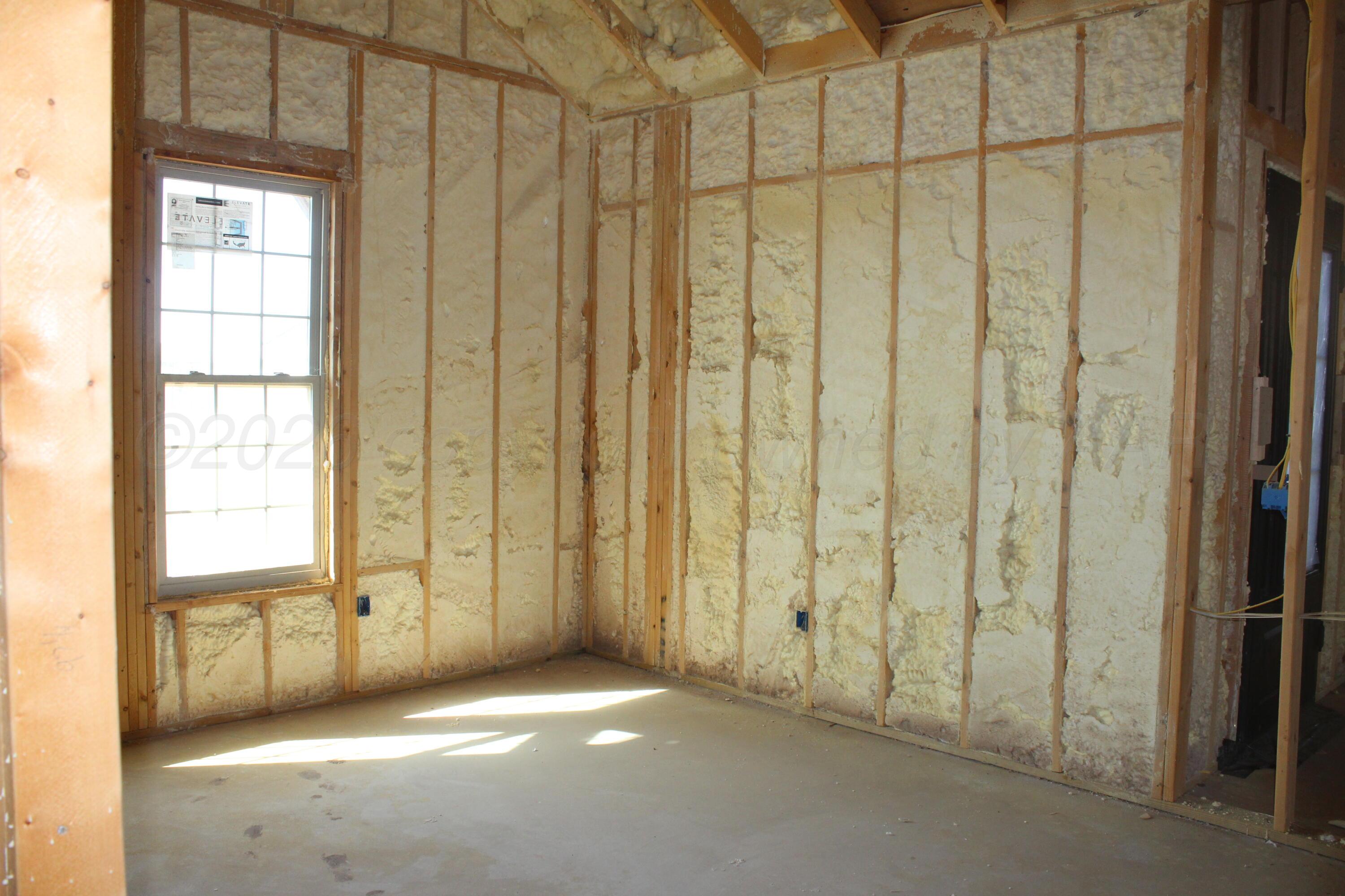 8300 Matilda Lane Amarillo, TX 79119 - Photo 10 of 14 a view of an empty room with a window