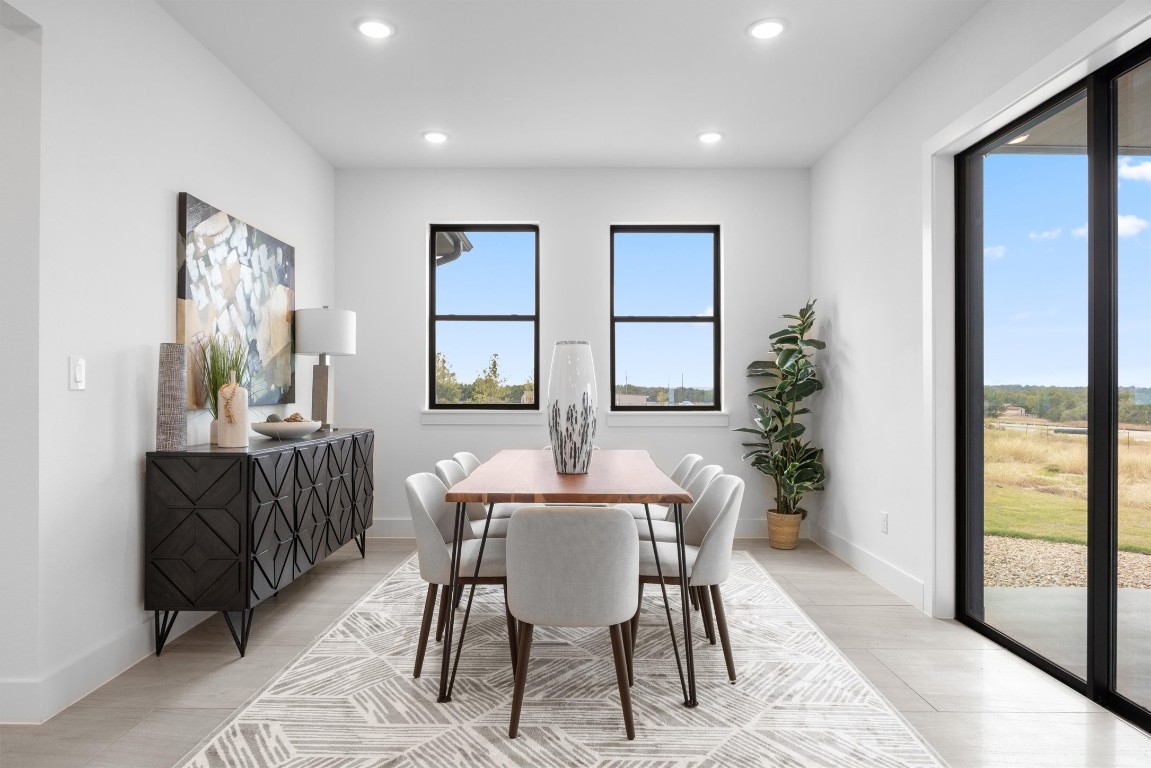101 Fall Drive Georgetown, TX 78633 - Photo 12 of 40 a dining room with furniture and window