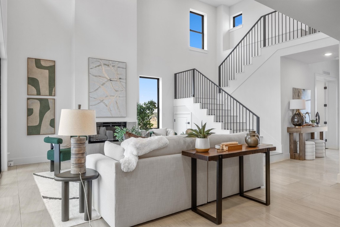 101 Fall Drive Georgetown, TX 78633 - Photo 14 of 40 a living room with furniture and wooden floor