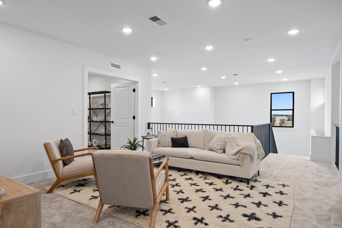 101 Fall Drive Georgetown, TX 78633 - Photo 24 of 40 a living room with furniture and a couch