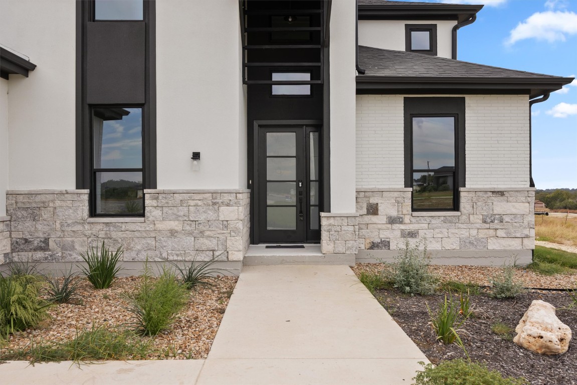 101 Fall Drive Georgetown, TX 78633 - Photo 3 of 40 a front view of a house with a yard