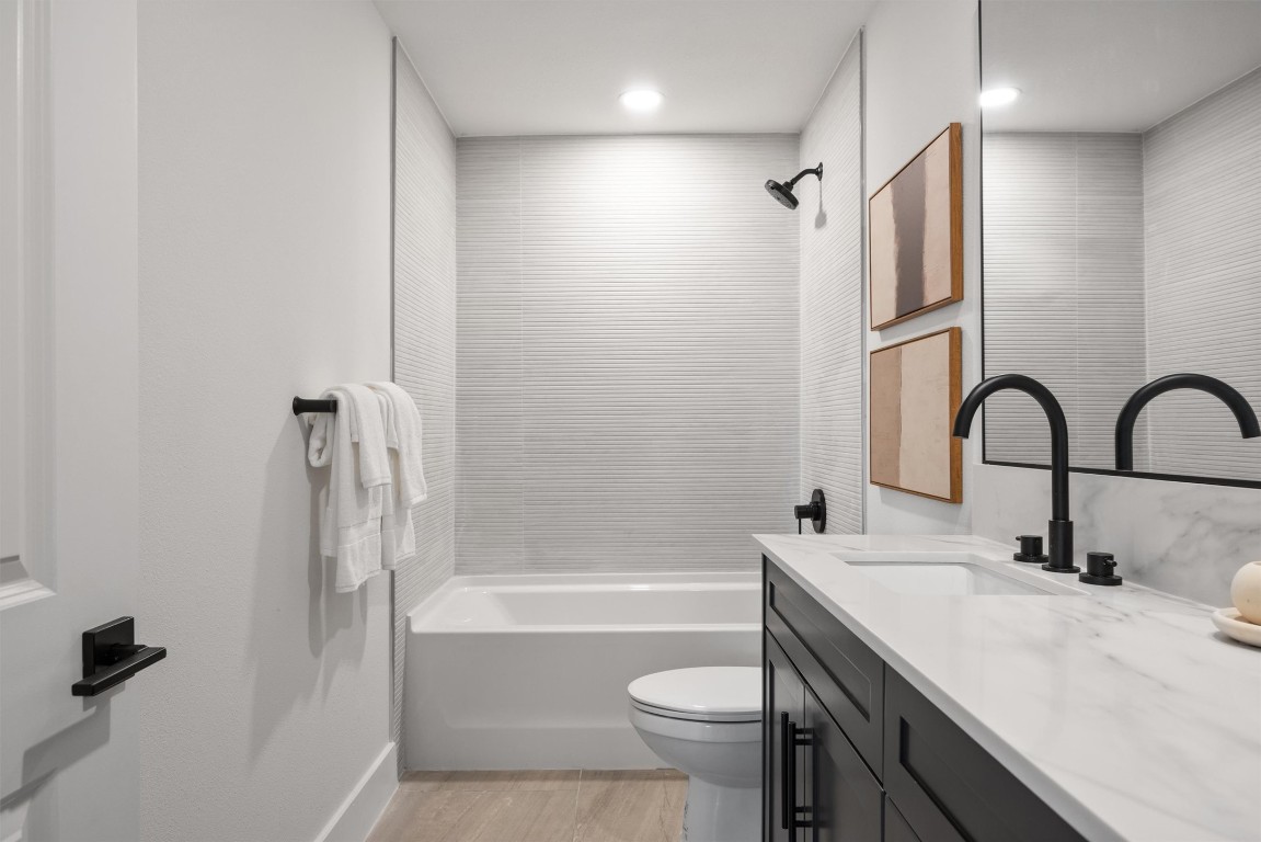 101 Fall Drive Georgetown, TX 78633 - Photo 32 of 40 a bathroom with a sink a toilet and shower