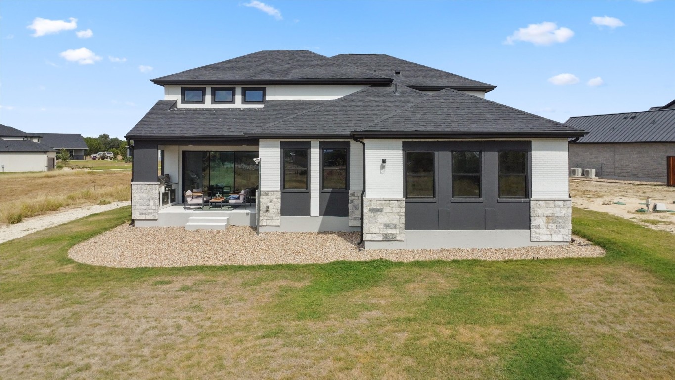 101 Fall Drive Georgetown, TX 78633 - Photo 36 of 40 a view of a house with garden and patio