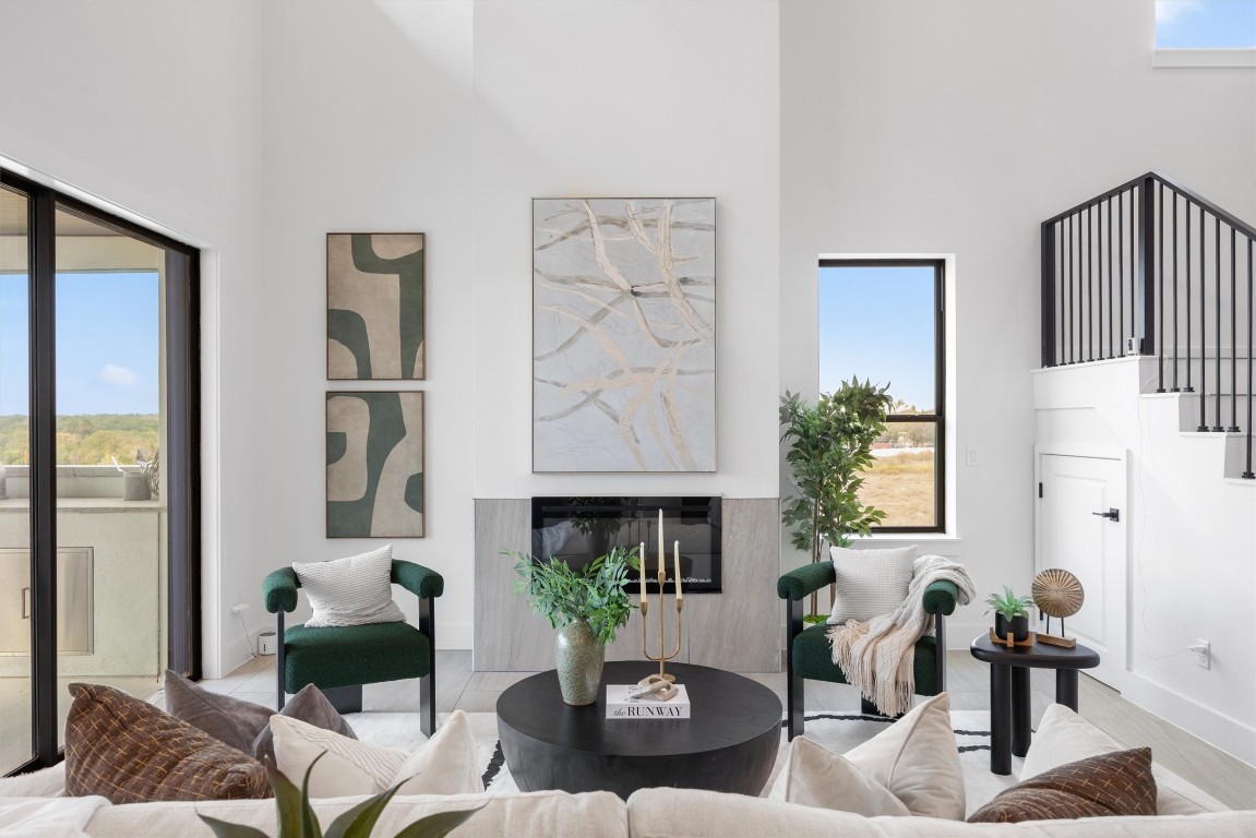 101 Fall Drive Georgetown, TX 78633 - Photo 8 of 40 a living room with furniture and a fireplace