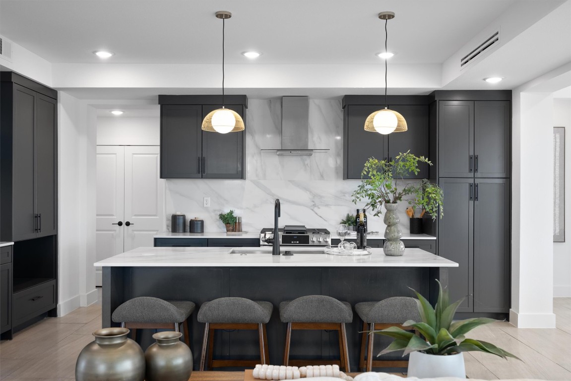 101 Fall Drive Georgetown, TX 78633 - Photo 10 of 40 a kitchen with a table and chairs in it