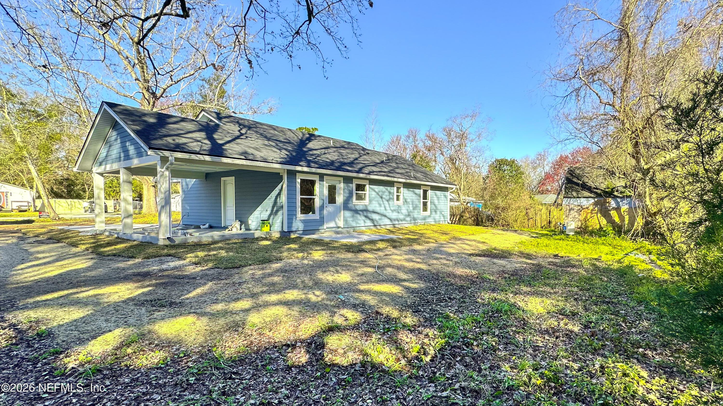 86549 Hester Drive Yulee, FL 32097 - Photo 17 of 18 a view of a house with a yard
