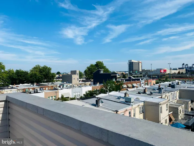 a view of a terrace with chairs