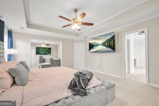 a spacious bathroom with a sink and a mirror