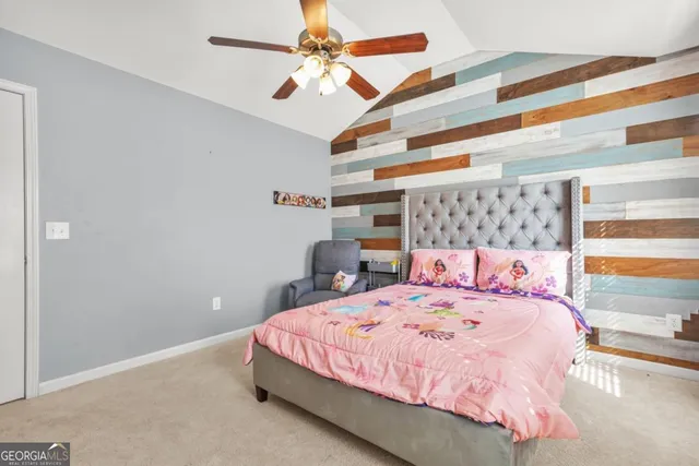 a bathroom with a double vanity sink and mirror
