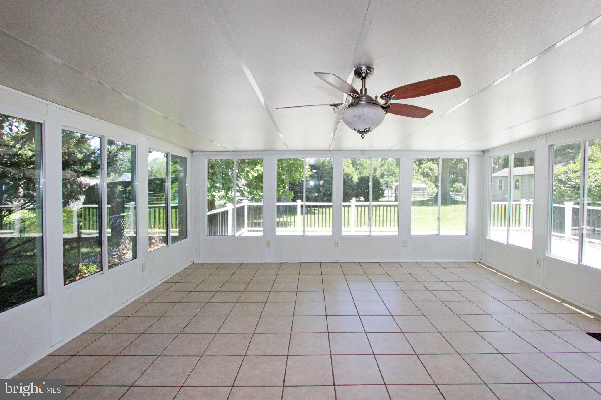 929 Cherry Tree Road Aston, PA 19014 - Photo 6 of 26 Bright and airy sunroom retreat.