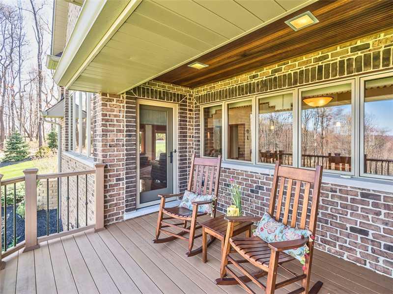 251 Ridge Road Zelienople, PA 16063 - Photo 15 of 25 Patio/Deck. porch off of both master bedroom & family room.