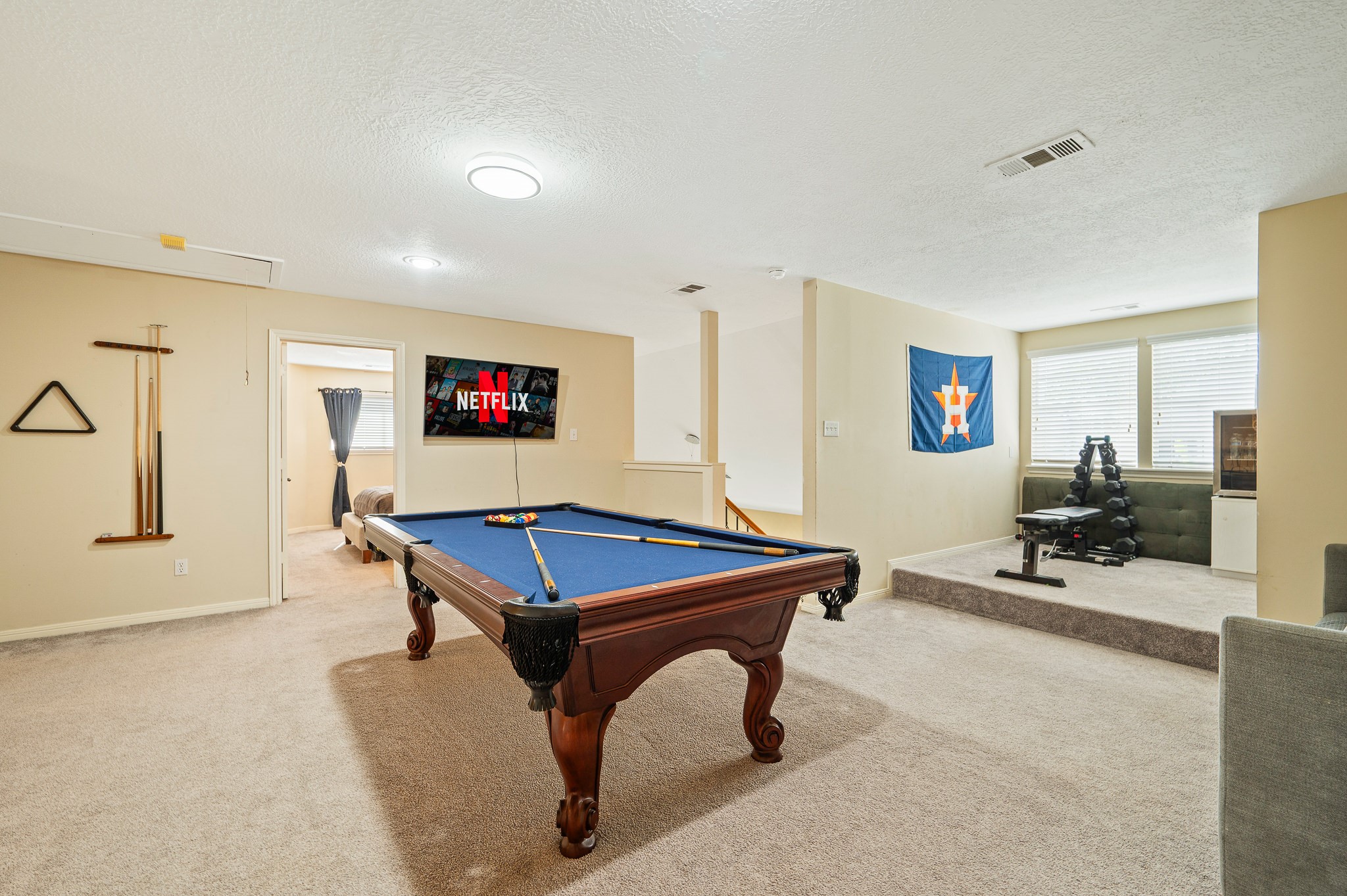 8111 Morningbrook Court Spring, TX 77379 - Photo 27 of 46 a room with pool table and windows