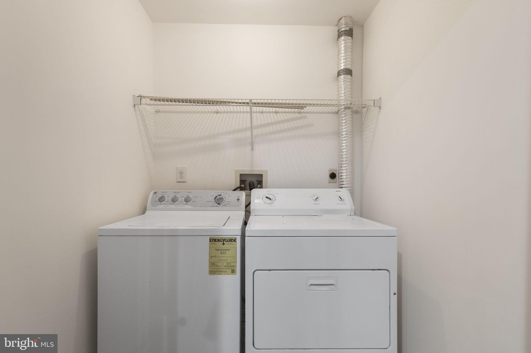 3514 Corn Stream Road Randallstown, MD 21133 - Photo 35 of 44 a utility room with dryer and washer