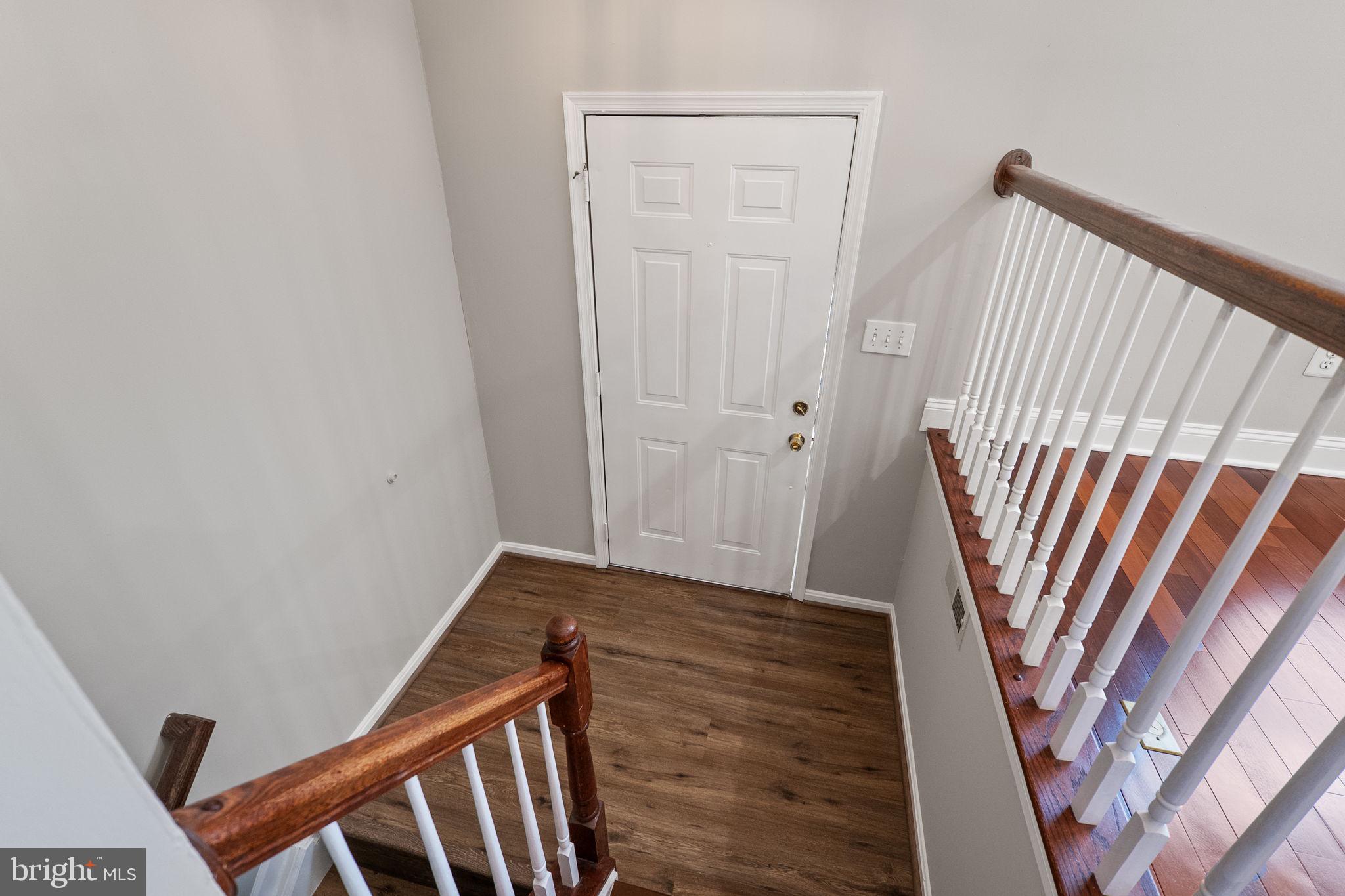3514 Corn Stream Road Randallstown, MD 21133 - Photo 5 of 44 a view of wooden floor and staircase