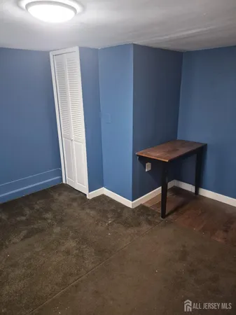 a room that has a table and chair in it