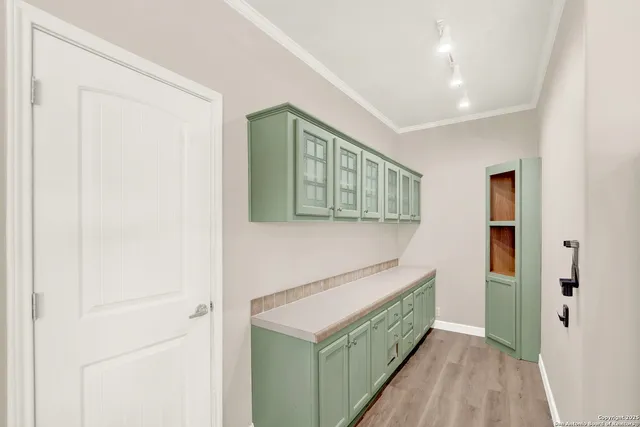 a bathroom with a sink a mirror and a toilet