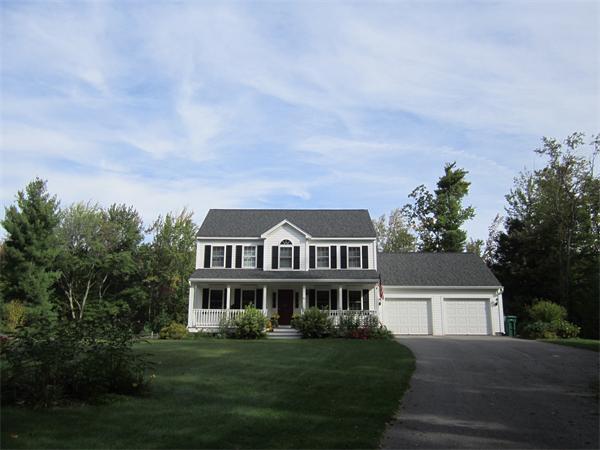 65 Carruth Road Templeton, MA 01468 - Photo 1 of 19 a front view of a house with a garden