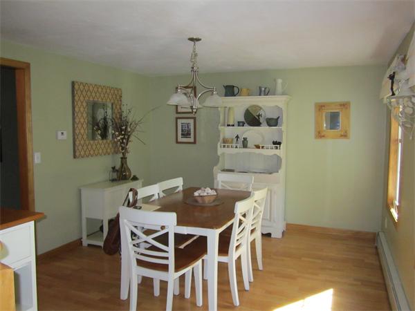 65 Carruth Road Templeton, MA 01468 - Photo 13 of 19 a view of a dining room with furniture and wooden floor