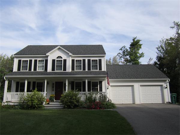 65 Carruth Road Templeton, MA 01468 - Photo 2 of 19 a front view of a house with a yard