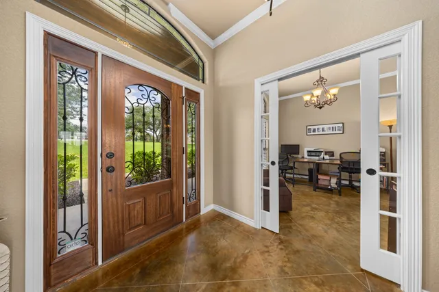 a view of livingroom with furniture and floor to ceiling window