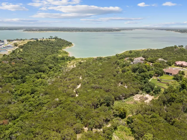 a view of a lake with a city