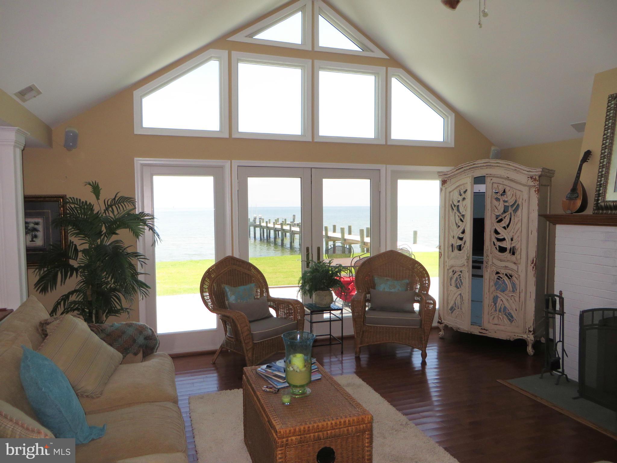 16144 Murray Road Ridge, MD 20680 - Photo 13 of 30 a living room with furniture and a large window