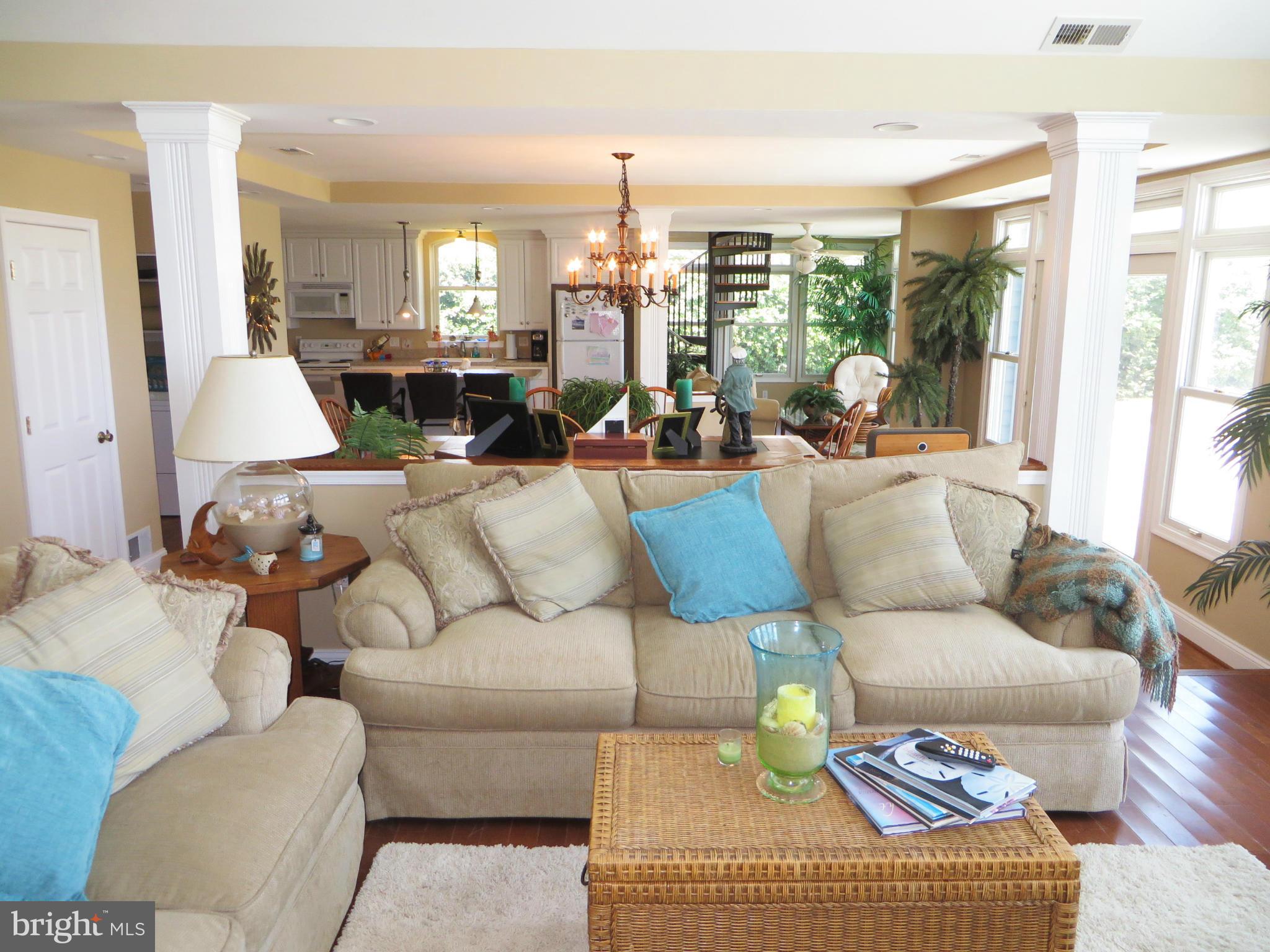 16144 Murray Road Ridge, MD 20680 - Photo 30 of 30 a living room with furniture or outdoor view and a large window
