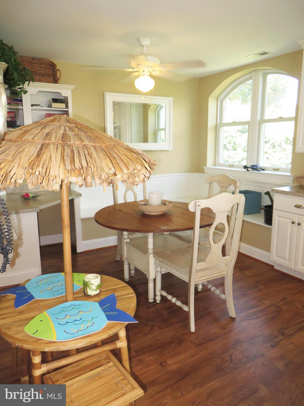 16144 Murray Road Ridge, MD 20680 - Photo 10 of 30 a dining room with furniture and wooden floor