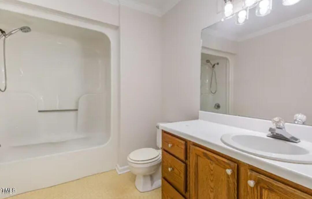 71 Stone Hill Court Durham, NC 27704 - Photo 8 of 13 a bathroom with a sink a toilet and shower