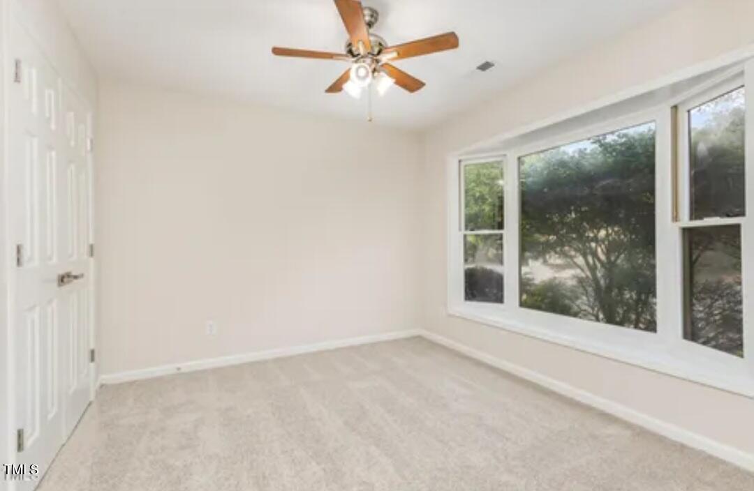 71 Stone Hill Court Durham, NC 27704 - Photo 10 of 13 en empty room with window