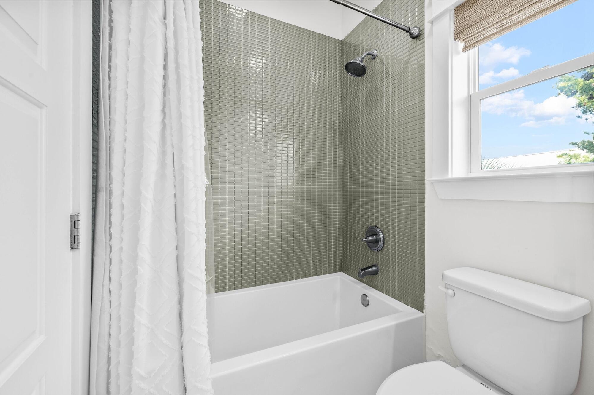 170 Seacrest Beach Boulevard East Inlet Beach, FL 32461 - Photo 11 of 38 a bathroom with a toilet and a bathtub