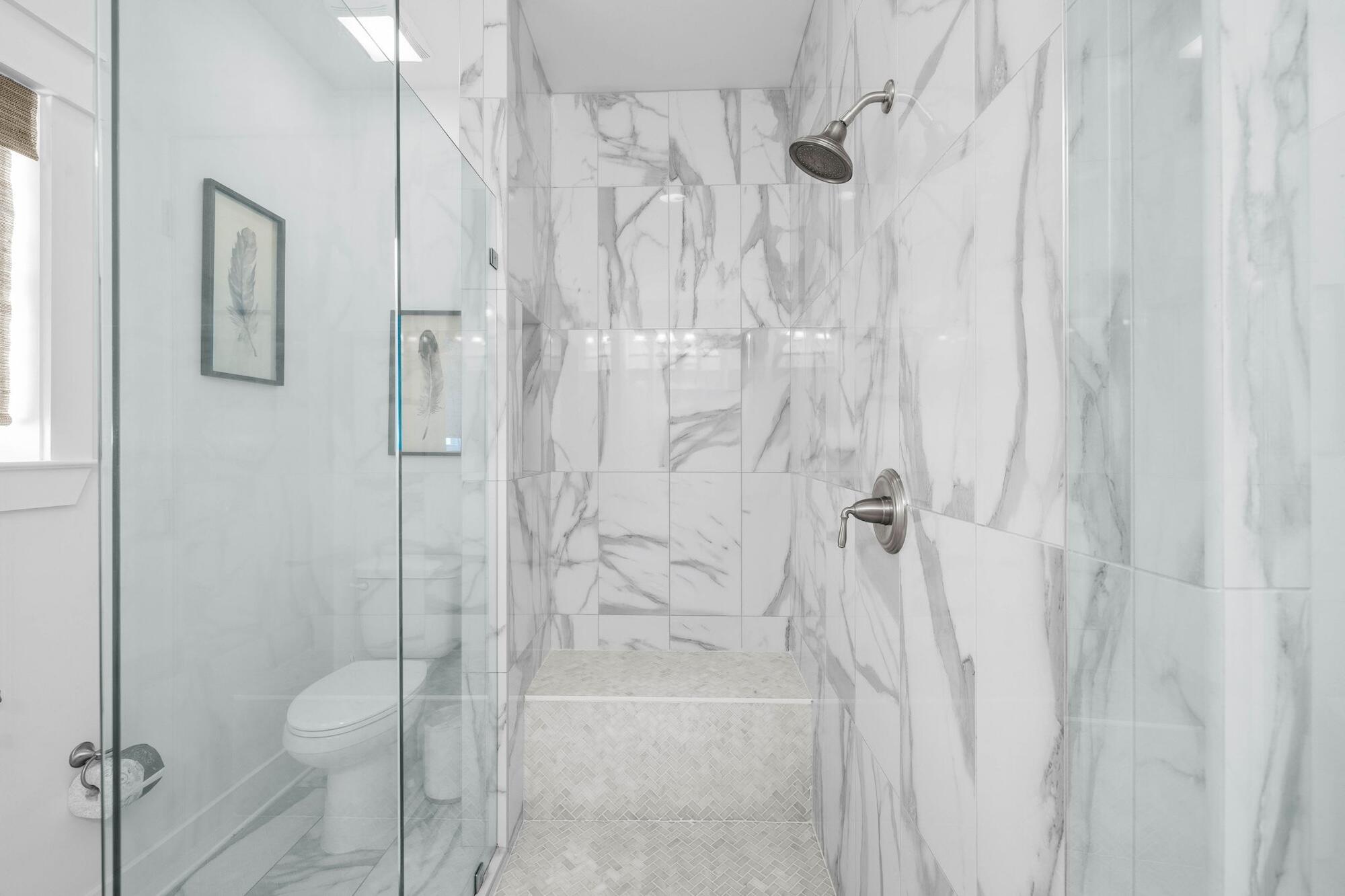 170 Seacrest Beach Boulevard East Inlet Beach, FL 32461 - Photo 19 of 38 a bathroom with a shower and toilet