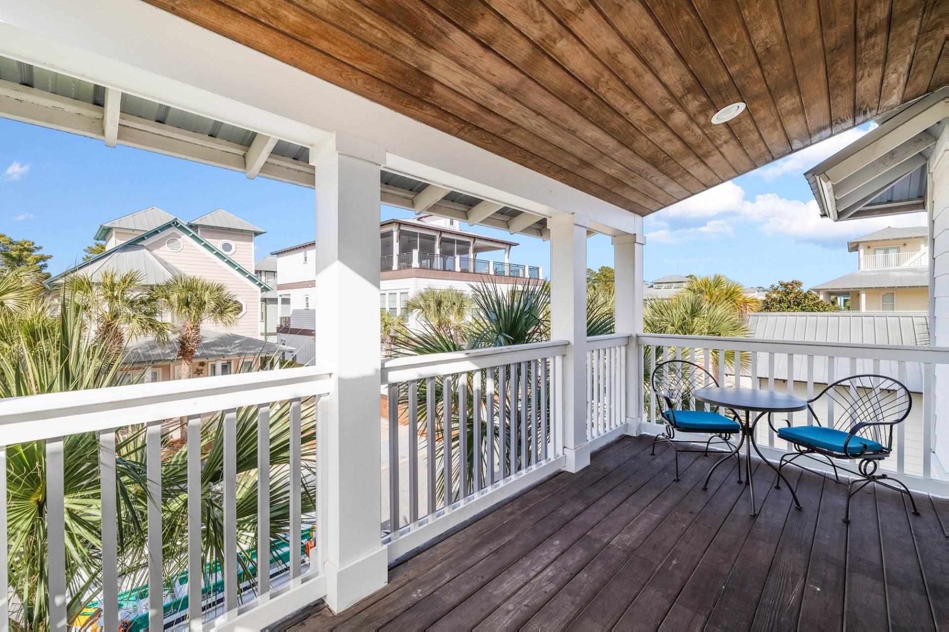 170 Seacrest Beach Boulevard East Inlet Beach, FL 32461 - Photo 22 of 38 a view of a chair and tables in balcony