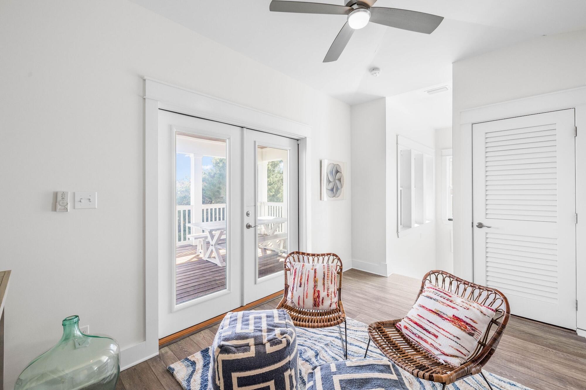 170 Seacrest Beach Boulevard East Inlet Beach, FL 32461 - Photo 24 of 38 a living room with furniture and wooden floor