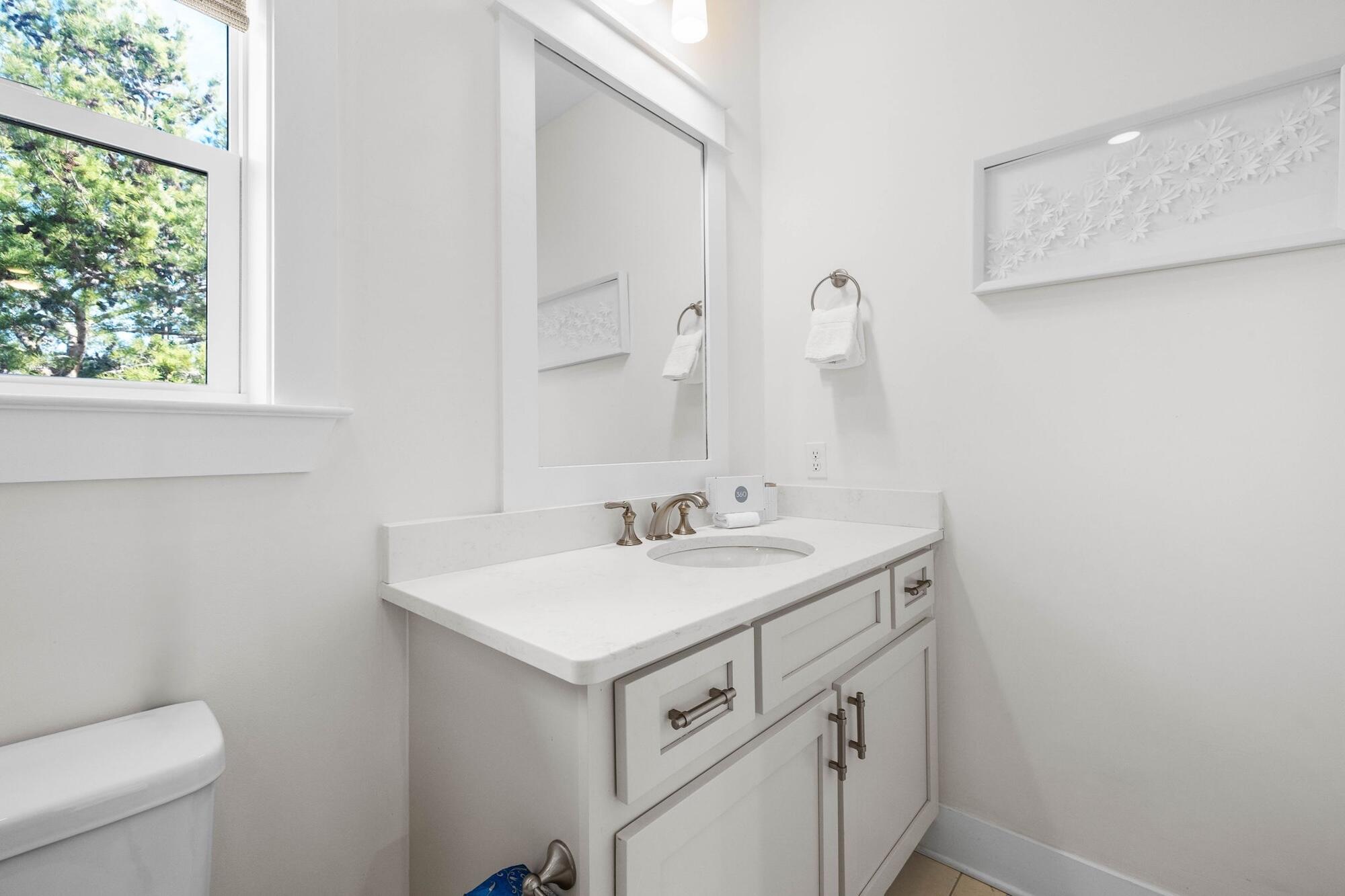 170 Seacrest Beach Boulevard East Inlet Beach, FL 32461 - Photo 30 of 38 a bathroom with a sink and a toilet