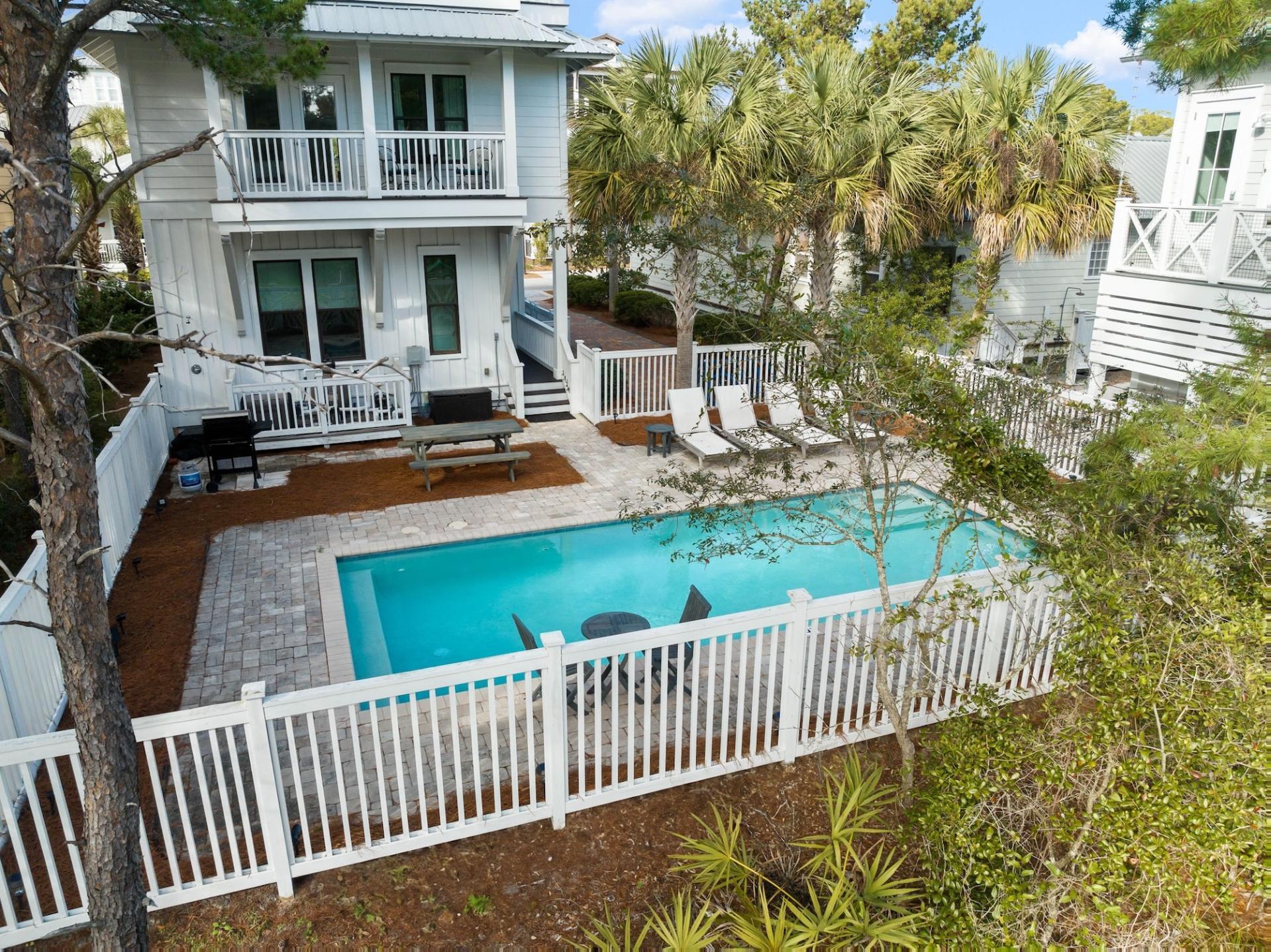 170 Seacrest Beach Boulevard East Inlet Beach, FL 32461 - Photo 33 of 38 a view of a house with backyard and sitting area