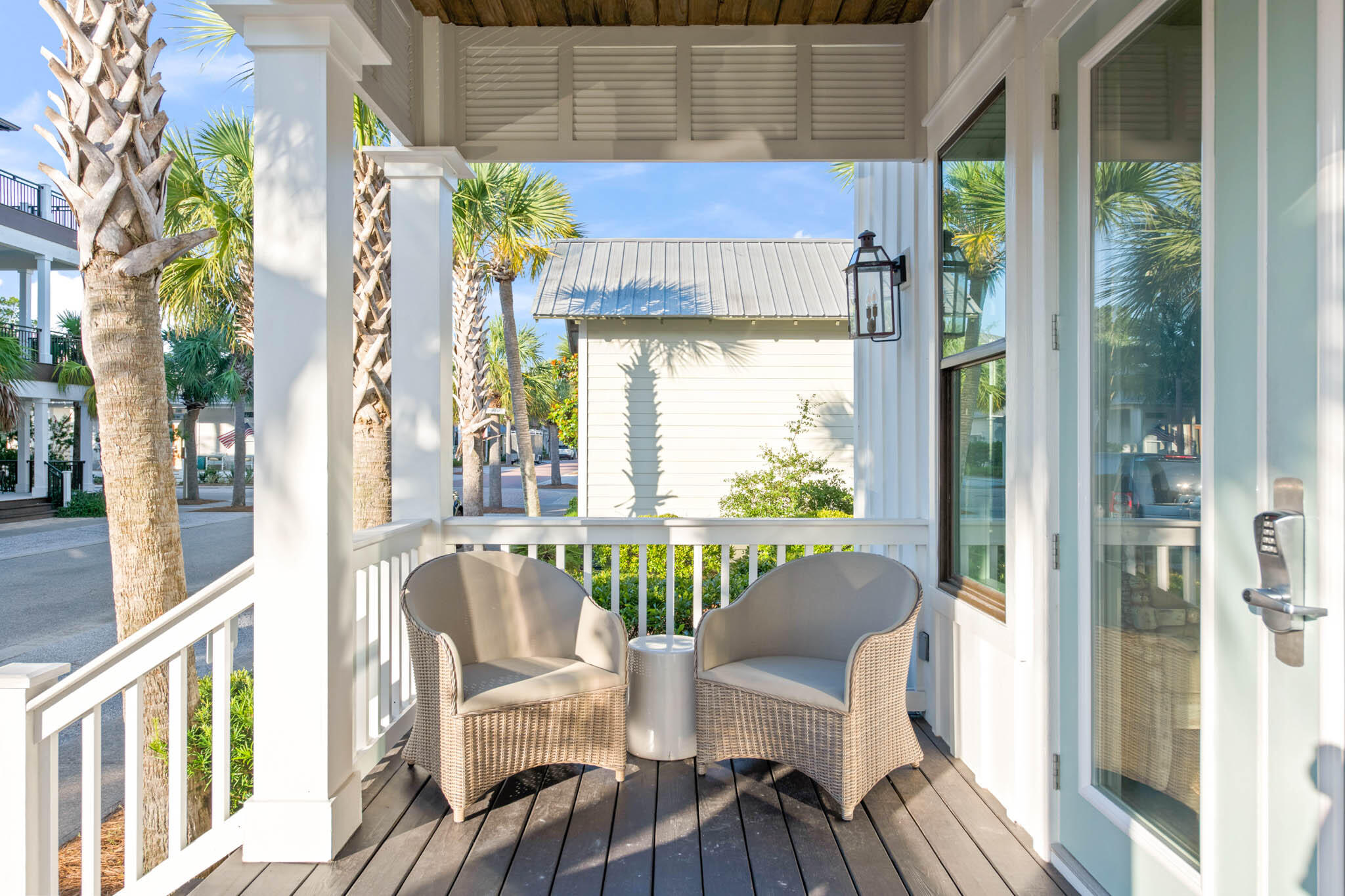 170 Seacrest Beach Boulevard East Inlet Beach, FL 32461 - Photo 36 of 38 a view of a balcony with table and chairs