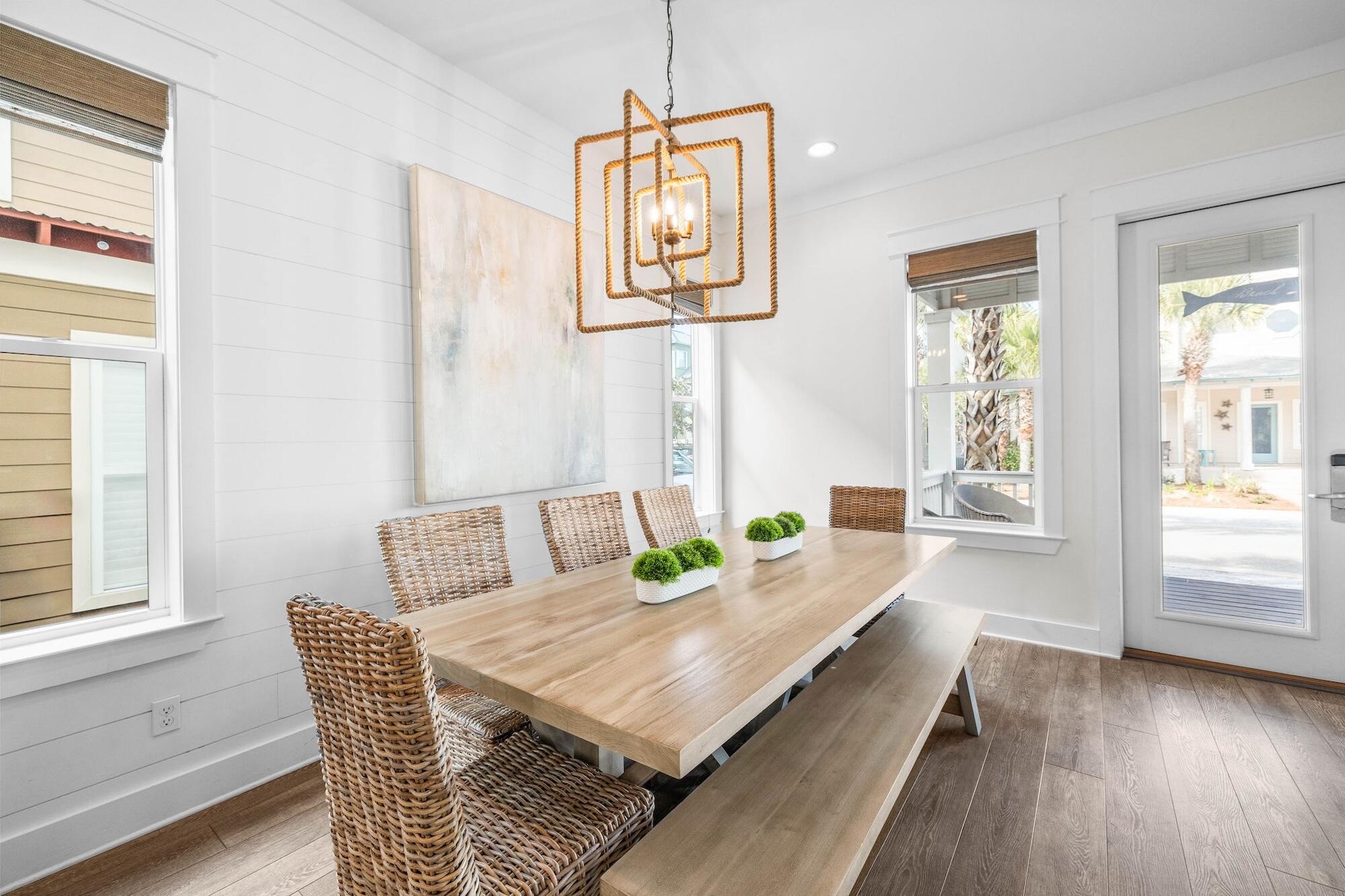170 Seacrest Beach Boulevard East Inlet Beach, FL 32461 - Photo 6 of 38 a living room with furniture and wooden floor