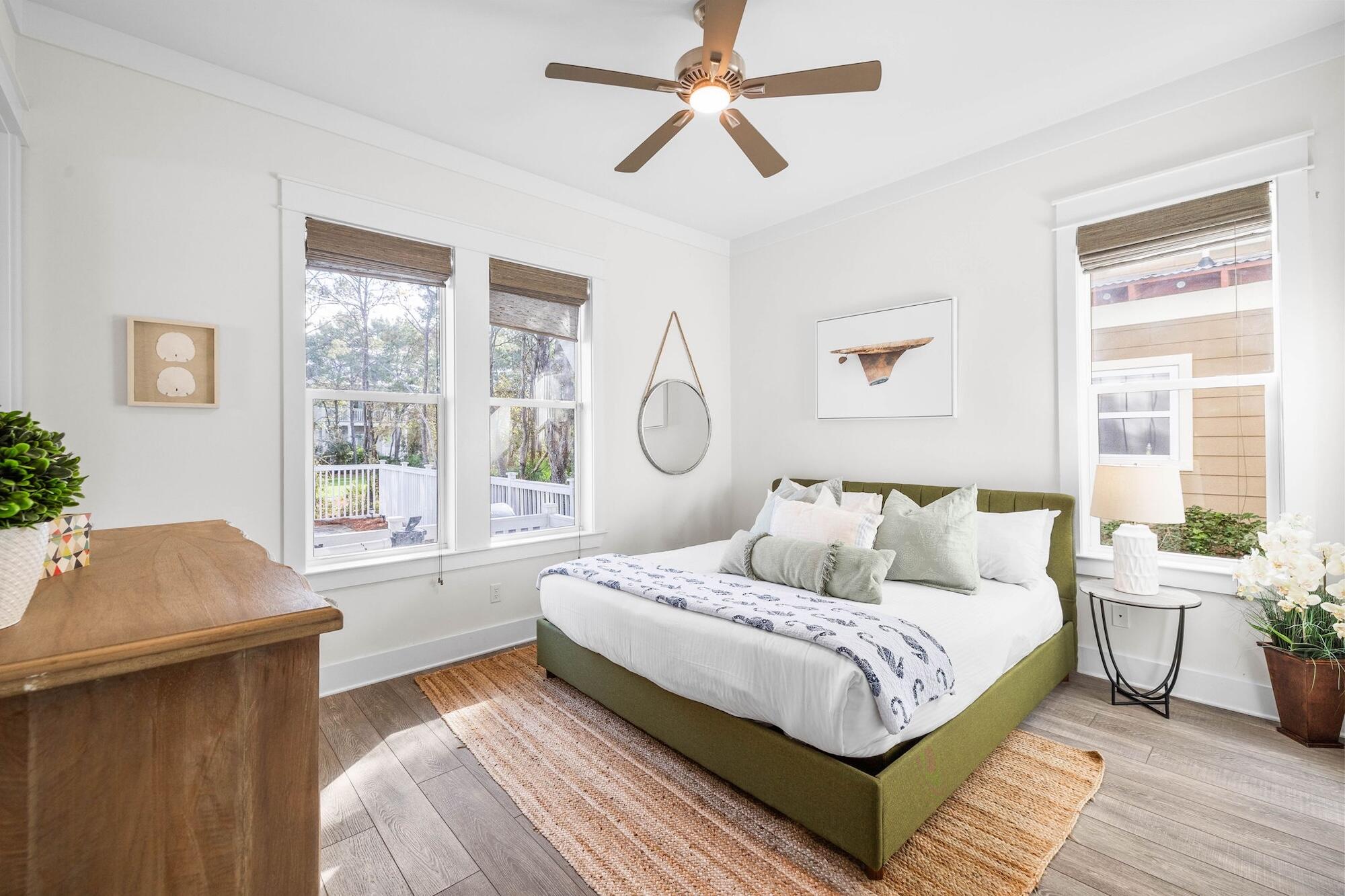 170 Seacrest Beach Boulevard East Inlet Beach, FL 32461 - Photo 9 of 38 a bedroom with a large bed and a window