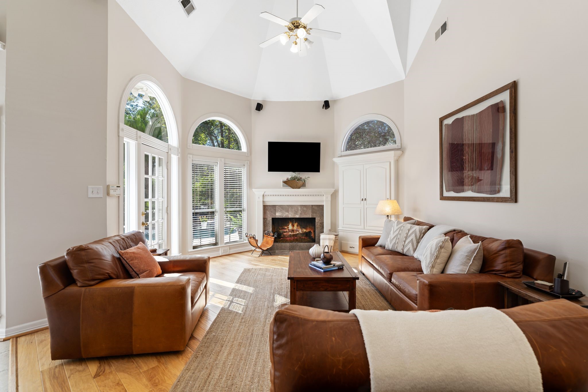 2 Bridgeberry Court Spring, TX 77381 - Photo 16 of 50 a living room with furniture fireplace and a large window