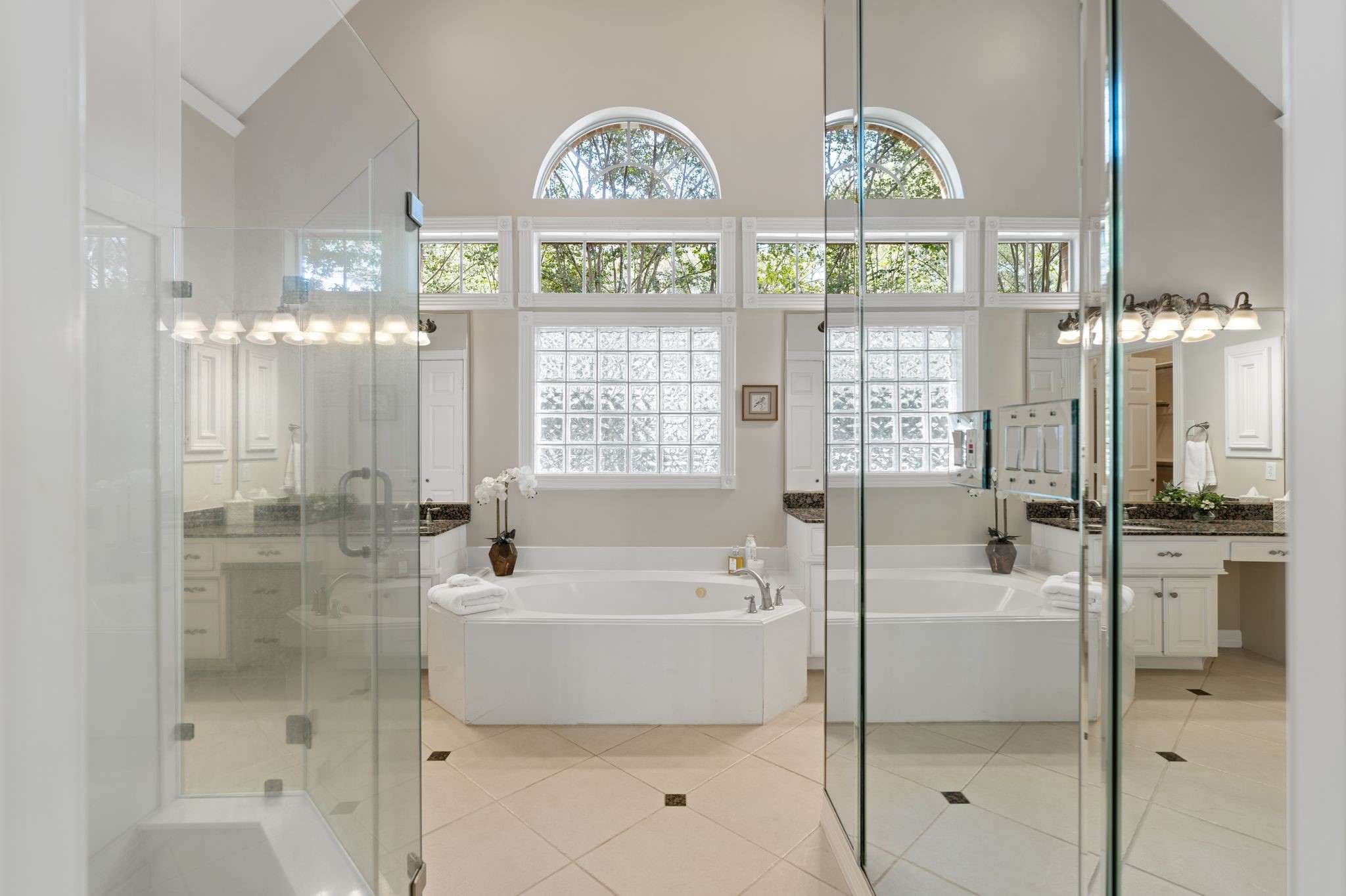 2 Bridgeberry Court Spring, TX 77381 - Photo 23 of 50 a spacious bathroom with a bathtub and a shower
